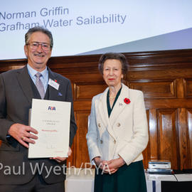 Norman receiving award from the Princess Royal
